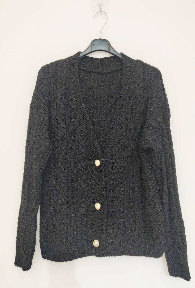 Gilet élégant en maille à boutons.
