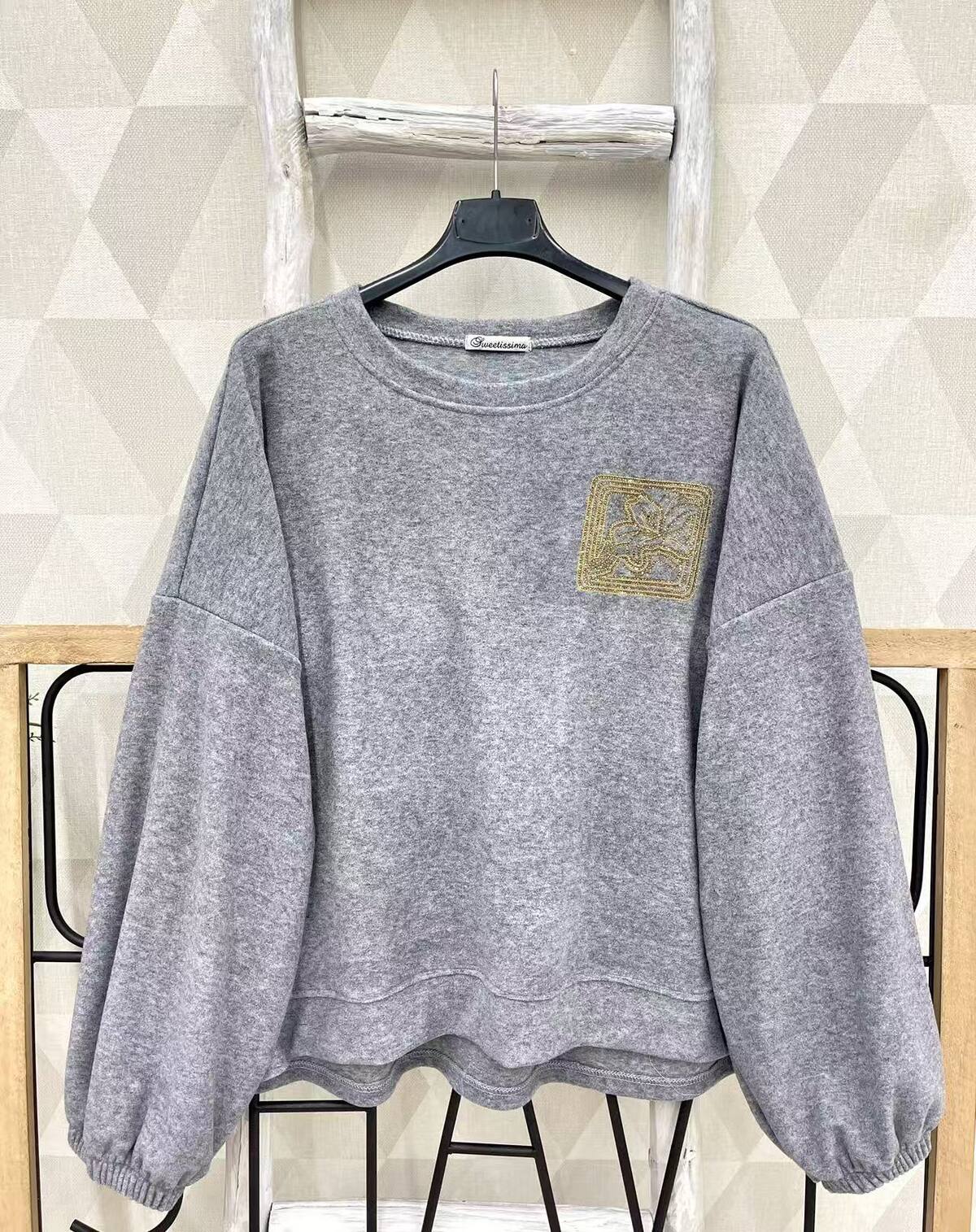 Pull avec strass doré