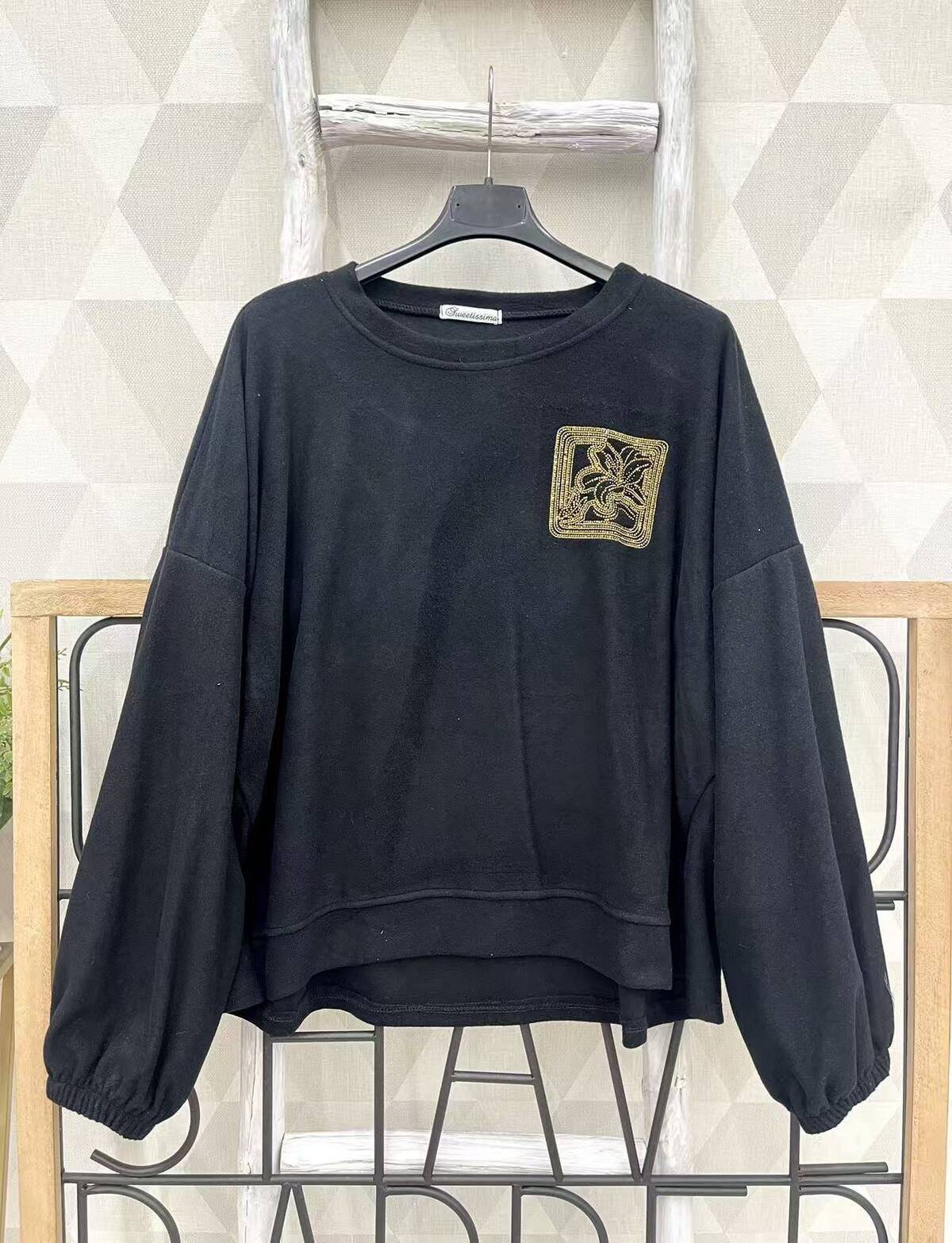 Pull avec strass doré
