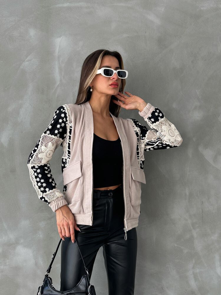 Veste à motifs beige et noire
