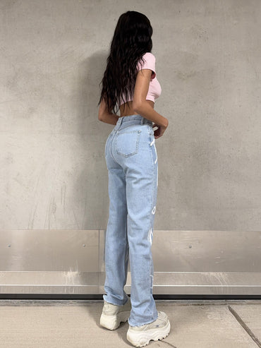 Jean straight fit avec imprimé graffiti blanc