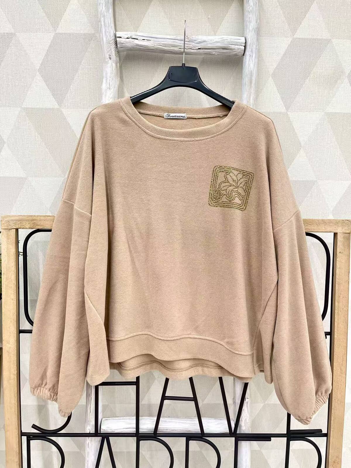 Pull avec strass doré