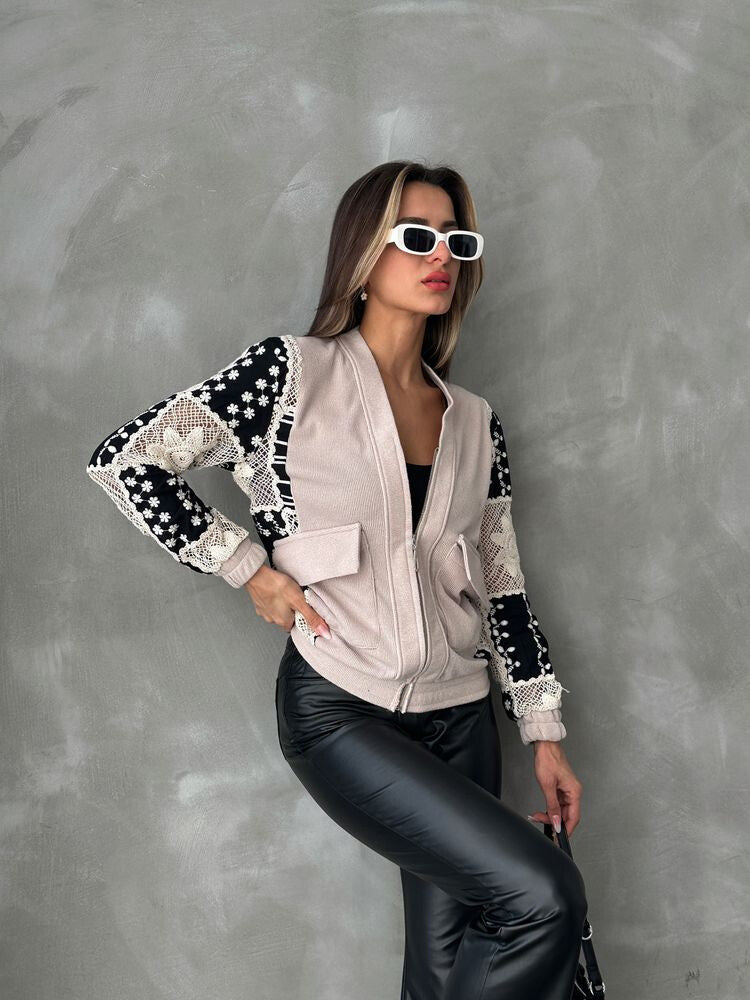Veste à motifs beige et noire