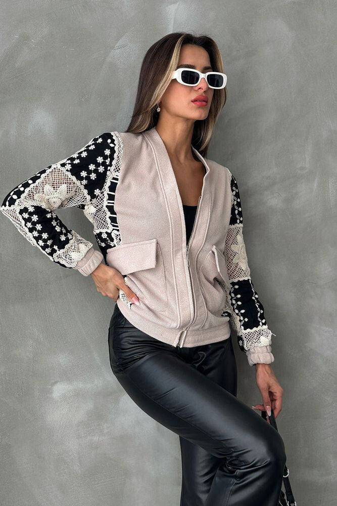 Veste à motifs beige et noire