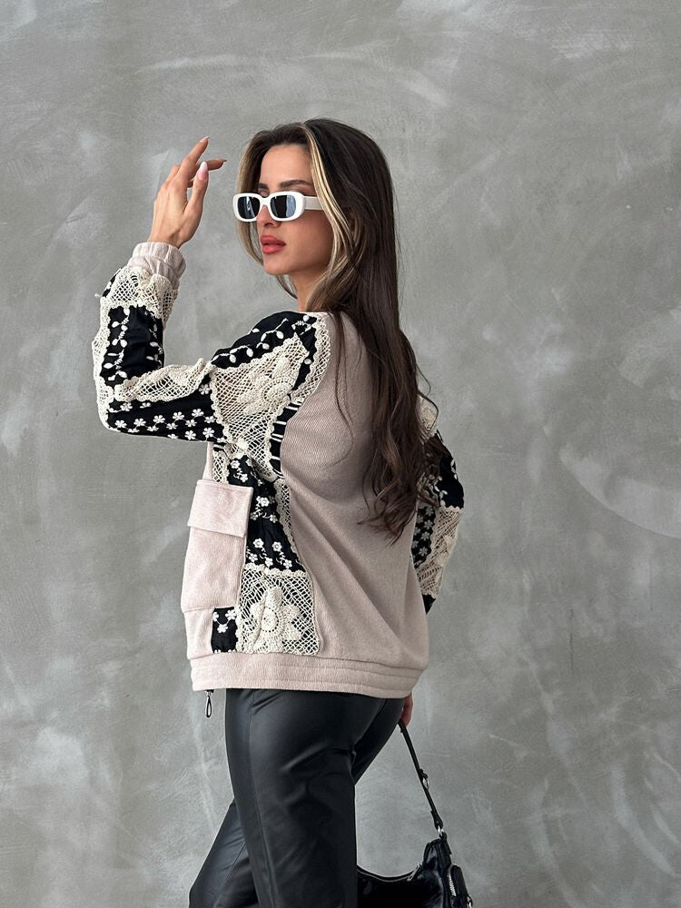 Veste à motifs beige et noire